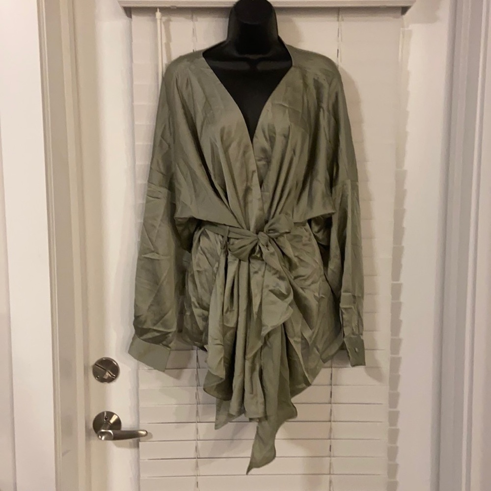 Wrap blouse with belt. Pet and smoke free home